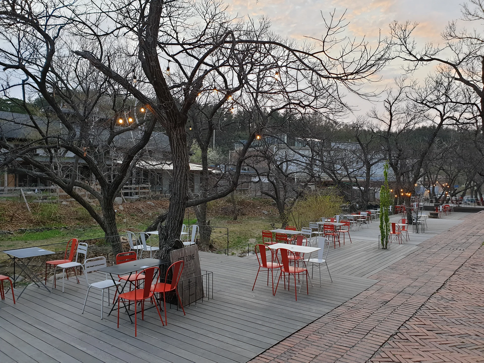 Wrap your phone in the cozy, Instagram-worthy atmosphere of Korean cafe culture. Korea's cafes are more than coffee shops — they're design experiences. These wallpapers feature warm interior light falling on minimalist wooden counters, perfectly crafted latte art in handmade ceramic cups, floor-to-ceiling windows overlooking quiet streets, and rooftop terraces with city panoramas.

From industrial-chic converted warehouses in Seongsu to tiny hidden basement cafes in Ikseon-dong, each image captures the aesthetic sensibility that makes Korean cafe design world-famous. Trailing plants, warm Edison bulbs, curated book walls, and the soft golden glow of afternoon light create scenes you'll want to stare at. Download these free Korean cafe wallpapers for a phone background that feels like a warm hug., Gangneung — Free Korean aesthetic wallpaper