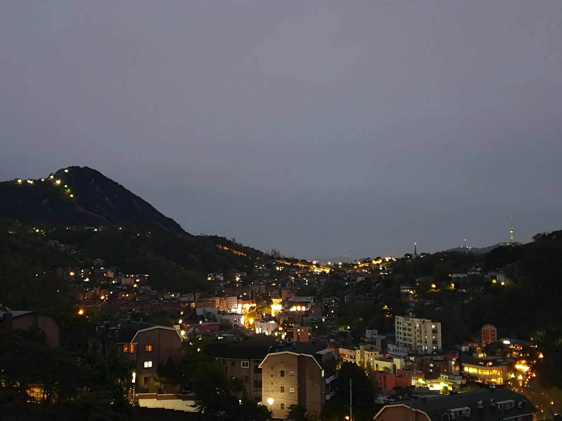 Explore Korea's architectural landscape through stunning phone wallpapers that span centuries of design. From the sleek glass curtain walls of Gangnam's skyscrapers to the raw concrete forms of brutalist apartment complexes, these images capture how Korea blends cutting-edge modernity with bold structural expression.

Look closer and you'll discover geometric patterns in subway station ceilings, sweeping curves of the Dongdaemun Design Plaza, and the quiet symmetry of traditional gate structures standing beside high-rises. Whether you're drawn to minimalist Korean design or dramatic urban geometry, these free aesthetic wallpapers transform your phone background into a gallery of architectural photography. — Free Korean aesthetic wallpaper