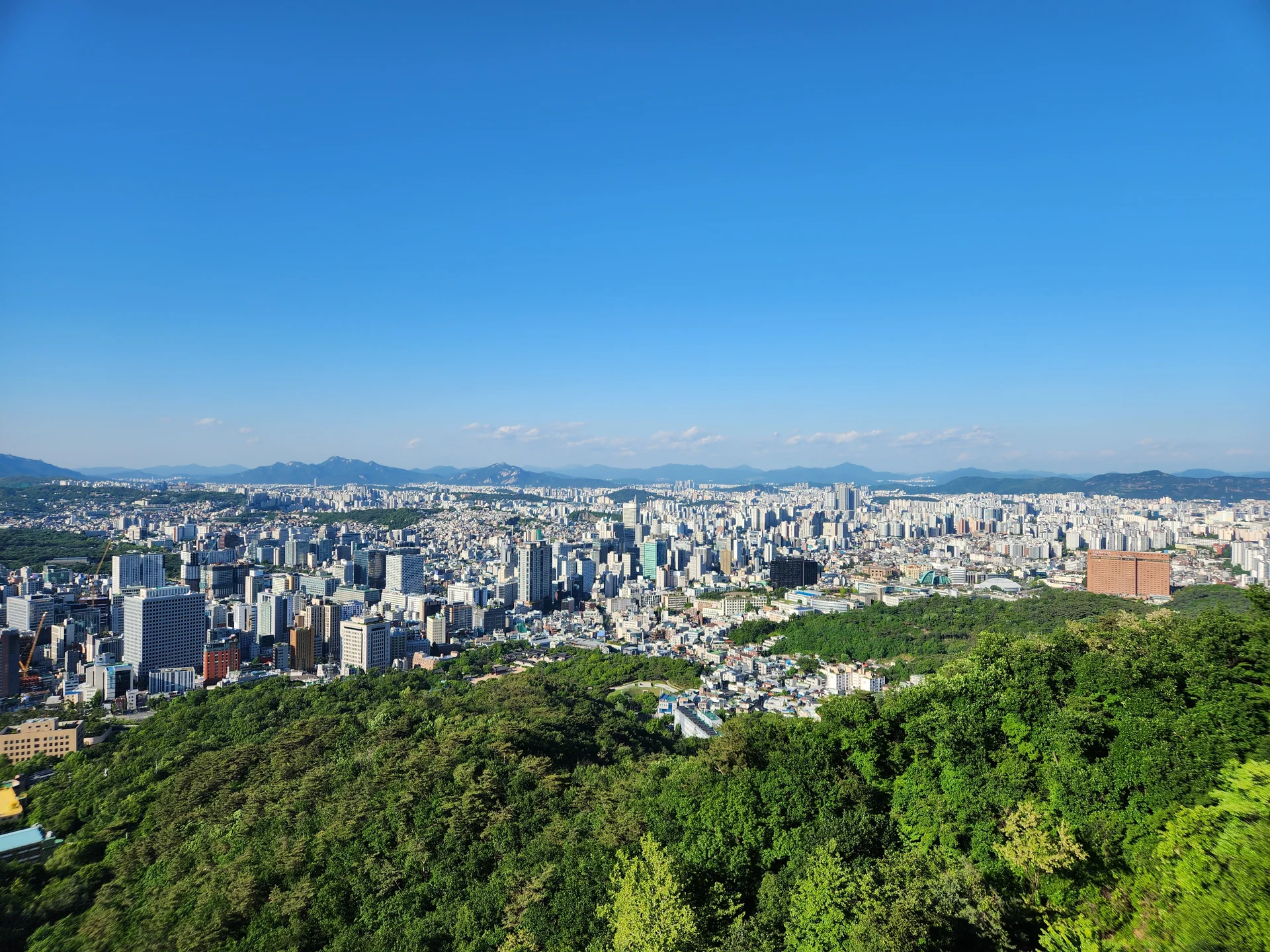 Explore Korea's architectural landscape through stunning phone wallpapers that span centuries of design. From the sleek glass curtain walls of Gangnam's skyscrapers to the raw concrete forms of brutalist apartment complexes, these images capture how Korea blends cutting-edge modernity with bold structural expression.

Look closer and you'll discover geometric patterns in subway station ceilings, sweeping curves of the Dongdaemun Design Plaza, and the quiet symmetry of traditional gate structures standing beside high-rises. Whether you're drawn to minimalist Korean design or dramatic urban geometry, these free aesthetic wallpapers transform your phone background into a gallery of architectural photography., Noksapyeong-daero, Yongsan 2(i)-ga-dong, Seoul — Free Korean aesthetic wallpaper