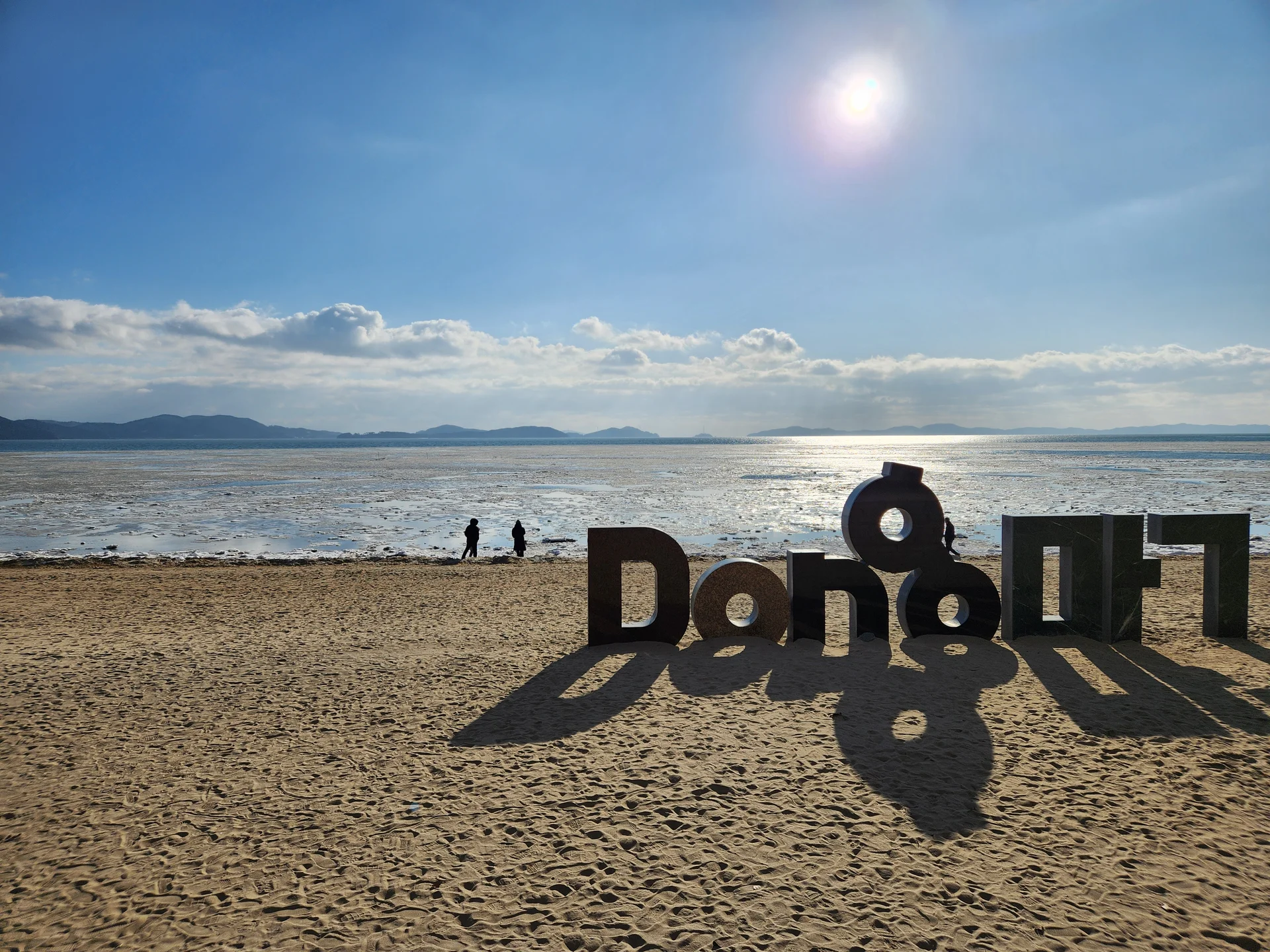 Immerse your screen in the untouched beauty of Korea's natural world. These Korean wallpapers feature sweeping countryside fields blanketed in green, hidden valleys where morning mist clings to the hillsides, and winding streams cutting through rocky terrain. Each photo captures the raw, peaceful energy that makes Korea's landscapes so distinctive.

From the volcanic plains of Jeju Island to the lush wetlands of Suncheon Bay, this collection showcases nature in every mood — dramatic storm clouds rolling over ridgelines, golden sunlight filtering through canopy gaps, and wildflower meadows stretching toward distant peaks. Download these aesthetic phone backgrounds for free and bring a moment of Korean tranquility to your daily life., Haeannam-ro, Incheon — Free Korean aesthetic wallpaper