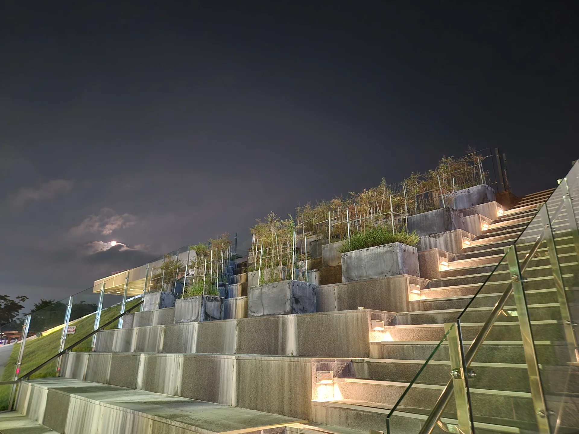 Light up your phone with the electric energy of Seoul after dark. These Korean nightscape wallpapers capture the city at its most cinematic — neon signage stacking up narrow alleyways, glowing street food stalls sending steam into cold night air, illuminated bridges spanning the Han River, and the shimmering towers of Gangnam reflected in rain-wet streets.

Seoul's nighttime personality is bold, colorful, and endlessly photogenic. You'll find the moody glow of Itaewon bars, the cyberpunk atmosphere of Euljiro's industrial blocks, and panoramic cityscapes from hilltop viewpoints where the city stretches to the horizon in every direction. Free download these aesthetic Seoul night wallpapers for a phone background that pulses with urban energy., Wonhyo-ro, Jungbu-dong, Gyeongju-si — Free Korean aesthetic wallpaper