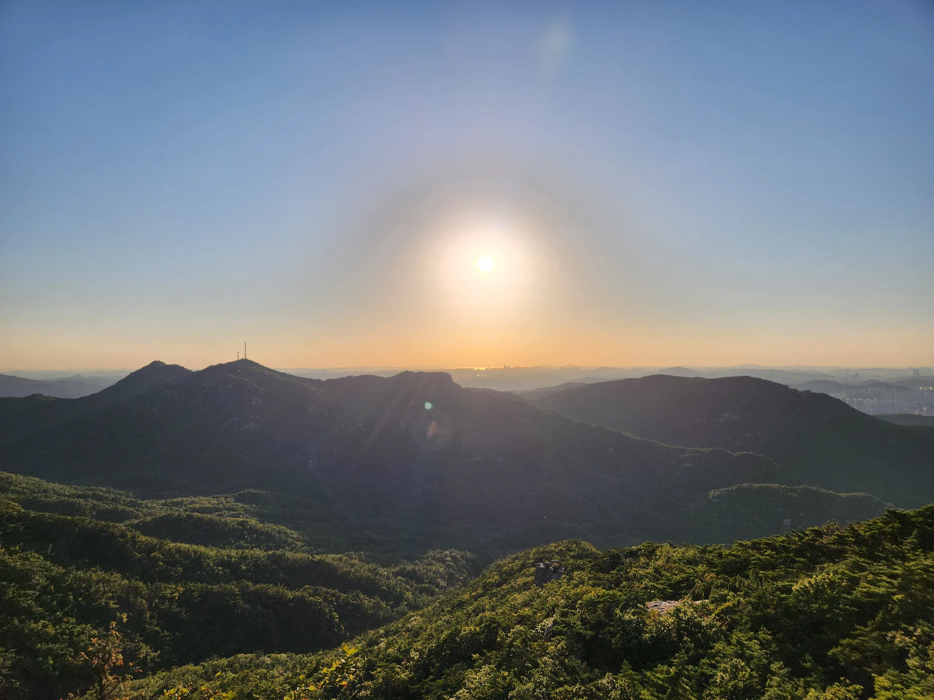 Immerse your screen in the untouched beauty of Korea's natural world. These Korean wallpapers feature sweeping countryside fields blanketed in green, hidden valleys where morning mist clings to the hillsides, and winding streams cutting through rocky terrain. Each photo captures the raw, peaceful energy that makes Korea's landscapes so distinctive.

From the volcanic plains of Jeju Island to the lush wetlands of Suncheon Bay, this collection showcases nature in every mood — dramatic storm clouds rolling over ridgelines, golden sunlight filtering through canopy gaps, and wildflower meadows stretching toward distant peaks. Download these aesthetic phone backgrounds for free and bring a moment of Korean tranquility to your daily life., Daehak-dong, Seoul — Free Korean aesthetic wallpaper