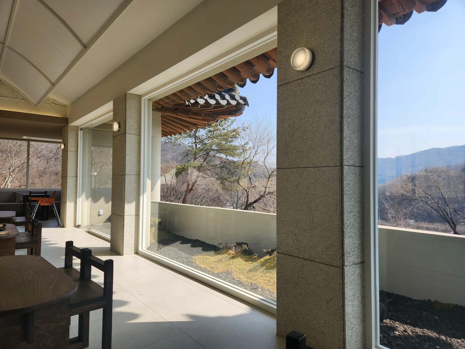 Adorn your phone with the timeless elegance of hanok, Korea's traditional wooden houses. These wallpapers showcase the graceful curved rooflines, hand-carved wooden lattice doors, and serene inner courtyards that have defined Korean residential architecture for centuries. Preserved hanok villages in Bukchon and Jeonju offer a living window into Korea's past.

Each image reveals the quiet beauty of these heritage homes — clay walls weathered to warm earth tones, dark timber frames contrasting with paper-screened windows, stone foundations meeting manicured courtyard gardens, and traditional eaves silhouetted against modern skylines. Download these free hanok wallpapers for an aesthetic phone background that celebrates the harmony between Korean tradition and contemporary life., Namhansanseong-ro, Gwangju-si — Free Korean aesthetic wallpaper