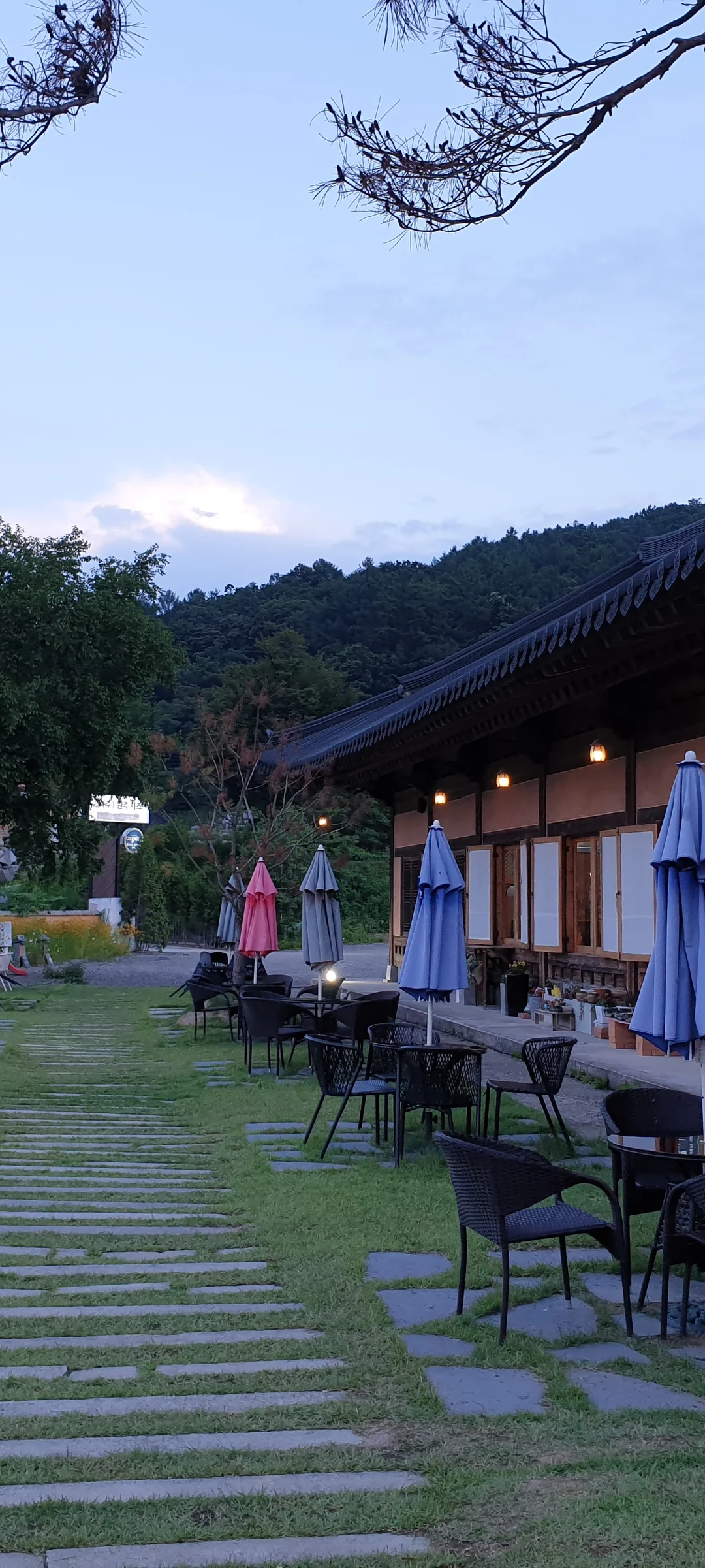 Adorn your phone with the timeless elegance of hanok, Korea's traditional wooden houses. These wallpapers showcase the graceful curved rooflines, hand-carved wooden lattice doors, and serene inner courtyards that have defined Korean residential architecture for centuries. Preserved hanok villages in Bukchon and Jeonju offer a living window into Korea's past.

Each image reveals the quiet beauty of these heritage homes — clay walls weathered to warm earth tones, dark timber frames contrasting with paper-screened windows, stone foundations meeting manicured courtyard gardens, and traditional eaves silhouetted against modern skylines. Download these free hanok wallpapers for an aesthetic phone background that celebrates the harmony between Korean tradition and contemporary life., Unknown — Free Korean aesthetic wallpaper