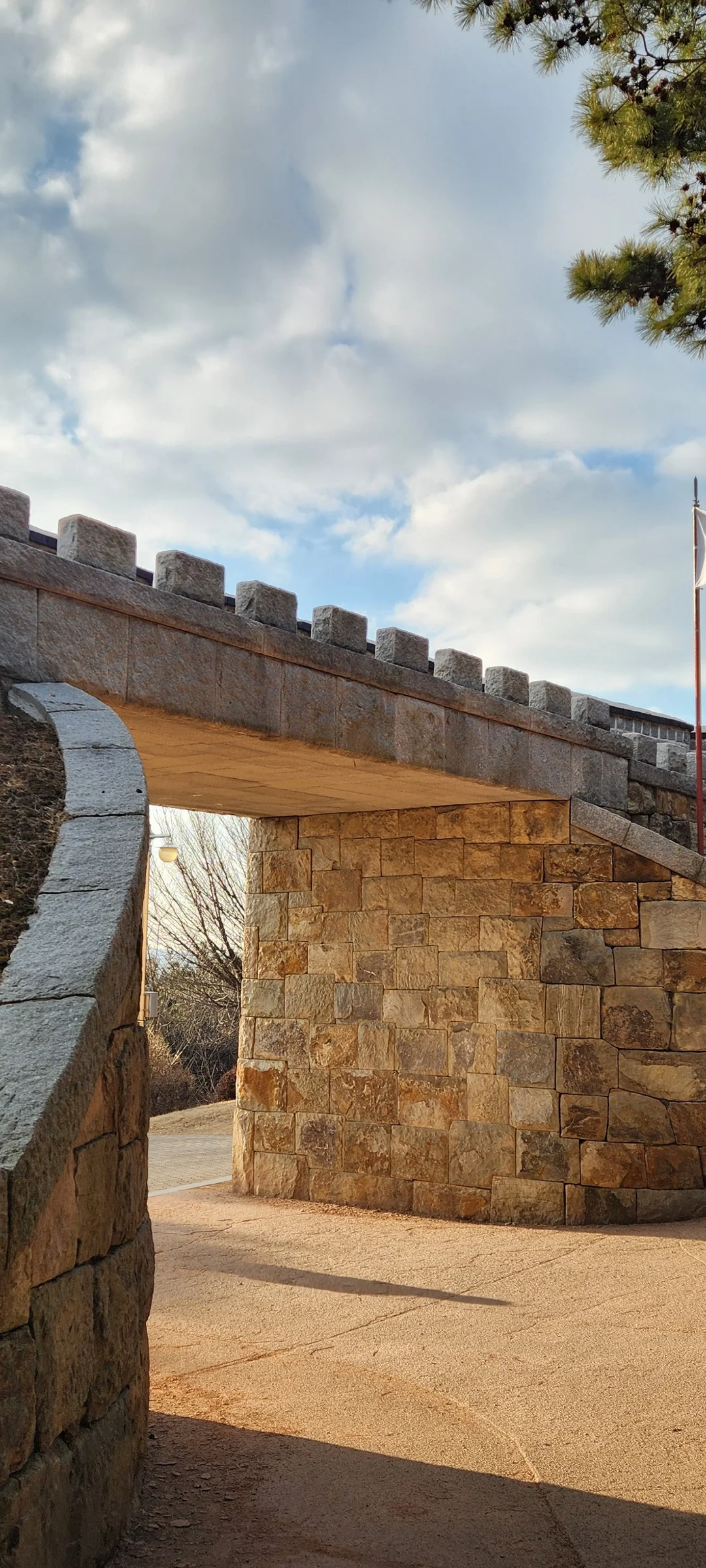 Explore Korea's architectural landscape through stunning phone wallpapers that span centuries of design. From the sleek glass curtain walls of Gangnam's skyscrapers to the raw concrete forms of brutalist apartment complexes, these images capture how Korea blends cutting-edge modernity with bold structural expression.

Look closer and you'll discover geometric patterns in subway station ceilings, sweeping curves of the Dongdaemun Design Plaza, and the quiet symmetry of traditional gate structures standing beside high-rises. Whether you're drawn to minimalist Korean design or dramatic urban geometry, these free aesthetic wallpapers transform your phone background into a gallery of architectural photography., Paldalsan-ro, Gyo-dong, 팔달구, Suwon-si — Free Korean aesthetic wallpaper