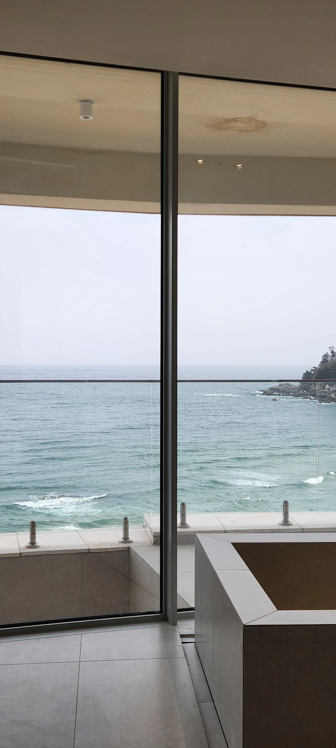 Wrap your phone in the cozy, Instagram-worthy atmosphere of Korean cafe culture. Korea's cafes are more than coffee shops — they're design experiences. These wallpapers feature warm interior light falling on minimalist wooden counters, perfectly crafted latte art in handmade ceramic cups, floor-to-ceiling windows overlooking quiet streets, and rooftop terraces with city panoramas.

From industrial-chic converted warehouses in Seongsu to tiny hidden basement cafes in Ikseon-dong, each image captures the aesthetic sensibility that makes Korean cafe design world-famous. Trailing plants, warm Edison bulbs, curated book walls, and the soft golden glow of afternoon light create scenes you'll want to stare at. Download these free Korean cafe wallpapers for a phone background that feels like a warm hug., Dongsankeun-gil, Hyeonnam — Free Korean aesthetic wallpaper