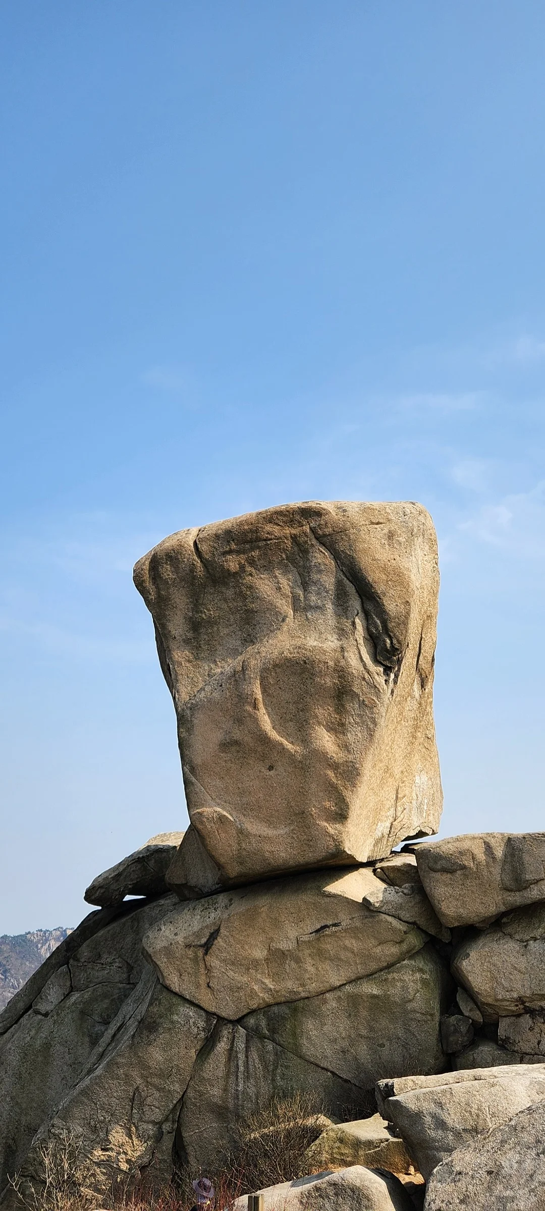 Set your phone against the majestic backdrop of Korea's mountain ranges. The Korean peninsula is nearly 70% mountainous, and these wallpapers celebrate that dramatic terrain — jagged granite peaks rising above the clouds, ancient fortress walls tracing ridgelines, and forest trails disappearing into autumn-colored valleys.

From the iconic rocky summits of Bukhansan in Seoul to the remote alpine meadows of Seoraksan, each image captures the scale and serenity of Korean mountain landscapes across all four seasons. Snow-dusted winter peaks, spring azalea blooms on hillsides, summer greenery, and fiery fall foliage are all here. Free download these aesthetic mountain wallpapers and carry Korea's highland grandeur in your pocket., Samobawi, Pyeongchang-dong, Seoul — Free Korean aesthetic wallpaper