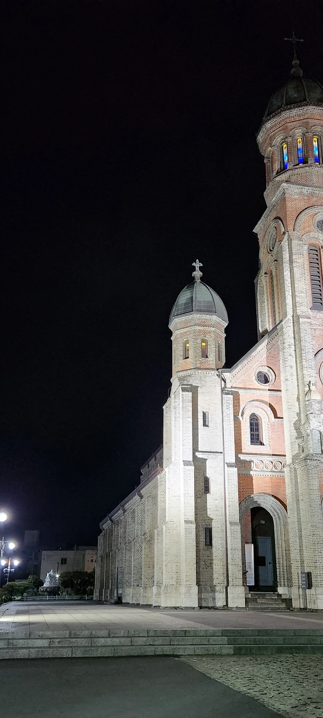 Explore Korea's architectural landscape through stunning phone wallpapers that span centuries of design. From the sleek glass curtain walls of Gangnam's skyscrapers to the raw concrete forms of brutalist apartment complexes, these images capture how Korea blends cutting-edge modernity with bold structural expression.

Look closer and you'll discover geometric patterns in subway station ceilings, sweeping curves of the Dongdaemun Design Plaza, and the quiet symmetry of traditional gate structures standing beside high-rises. Whether you're drawn to minimalist Korean design or dramatic urban geometry, these free aesthetic wallpapers transform your phone background into a gallery of architectural photography., Taejo-ro, Jeon-dong, Jeonju-si — Free Korean aesthetic wallpaper