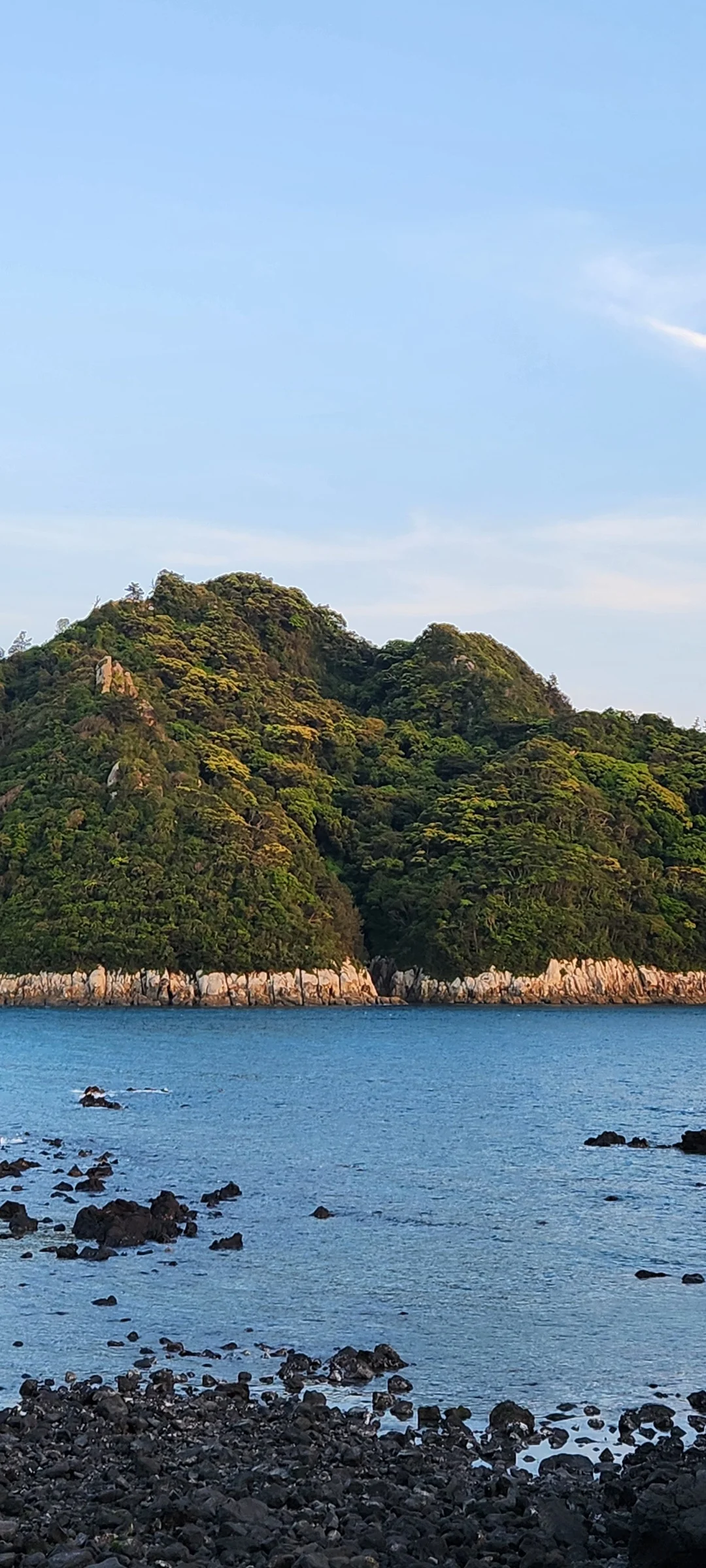 Immerse your screen in the untouched beauty of Korea's natural world. These Korean wallpapers feature sweeping countryside fields blanketed in green, hidden valleys where morning mist clings to the hillsides, and winding streams cutting through rocky terrain. Each photo captures the raw, peaceful energy that makes Korea's landscapes so distinctive.

From the volcanic plains of Jeju Island to the lush wetlands of Suncheon Bay, this collection showcases nature in every mood — dramatic storm clouds rolling over ridgelines, golden sunlight filtering through canopy gaps, and wildflower meadows stretching toward distant peaks. Download these aesthetic phone backgrounds for free and bring a moment of Korean tranquility to your daily life., Bomok-ro 64beon-gil, Songsan-dong, Seogwipo-si — Free Korean aesthetic wallpaper