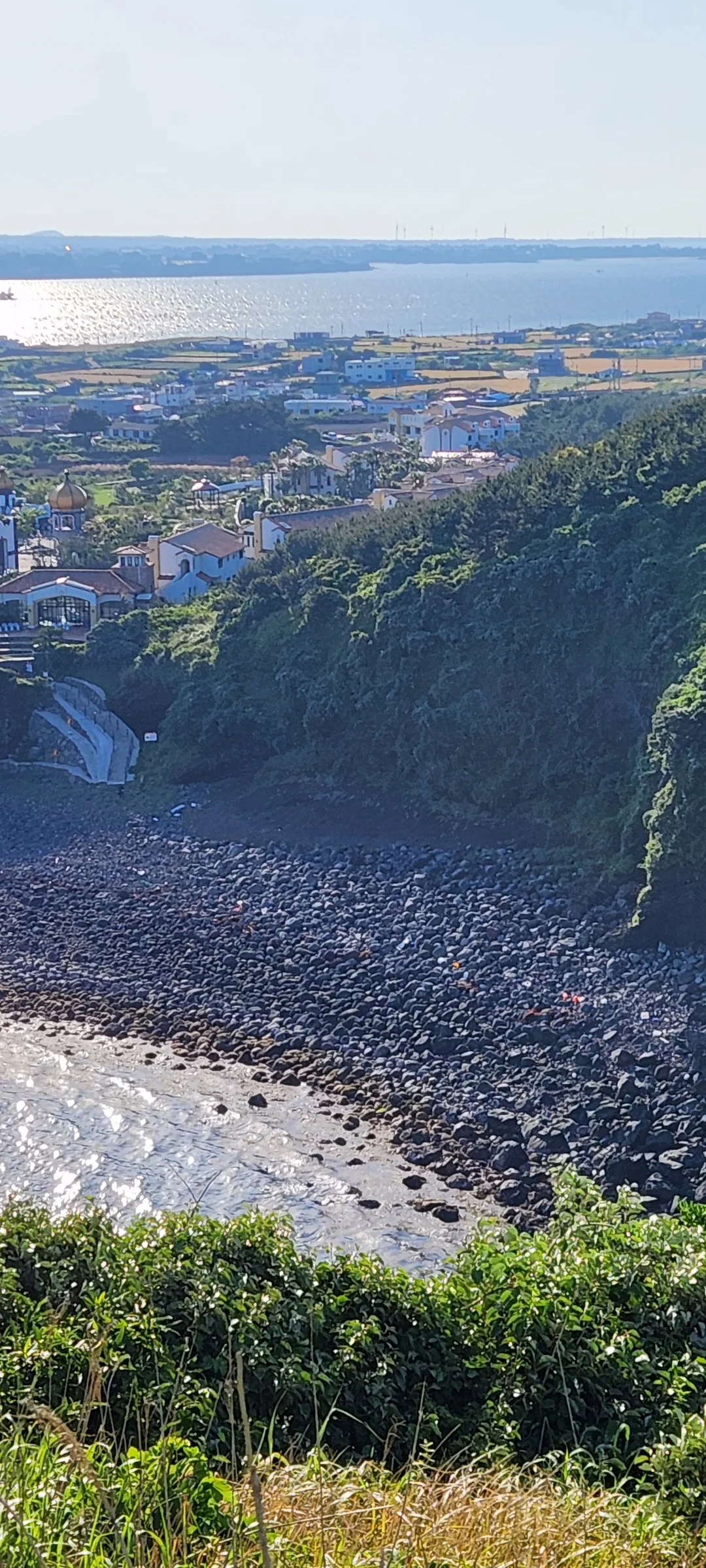 Immerse your screen in the untouched beauty of Korea's natural world. These Korean wallpapers feature sweeping countryside fields blanketed in green, hidden valleys where morning mist clings to the hillsides, and winding streams cutting through rocky terrain. Each photo captures the raw, peaceful energy that makes Korea's landscapes so distinctive.

From the volcanic plains of Jeju Island to the lush wetlands of Suncheon Bay, this collection showcases nature in every mood — dramatic storm clouds rolling over ridgelines, golden sunlight filtering through canopy gaps, and wildflower meadows stretching toward distant peaks. Download these aesthetic phone backgrounds for free and bring a moment of Korean tranquility to your daily life., Yeonpyeong-ri, Jeju — Free Korean aesthetic wallpaper