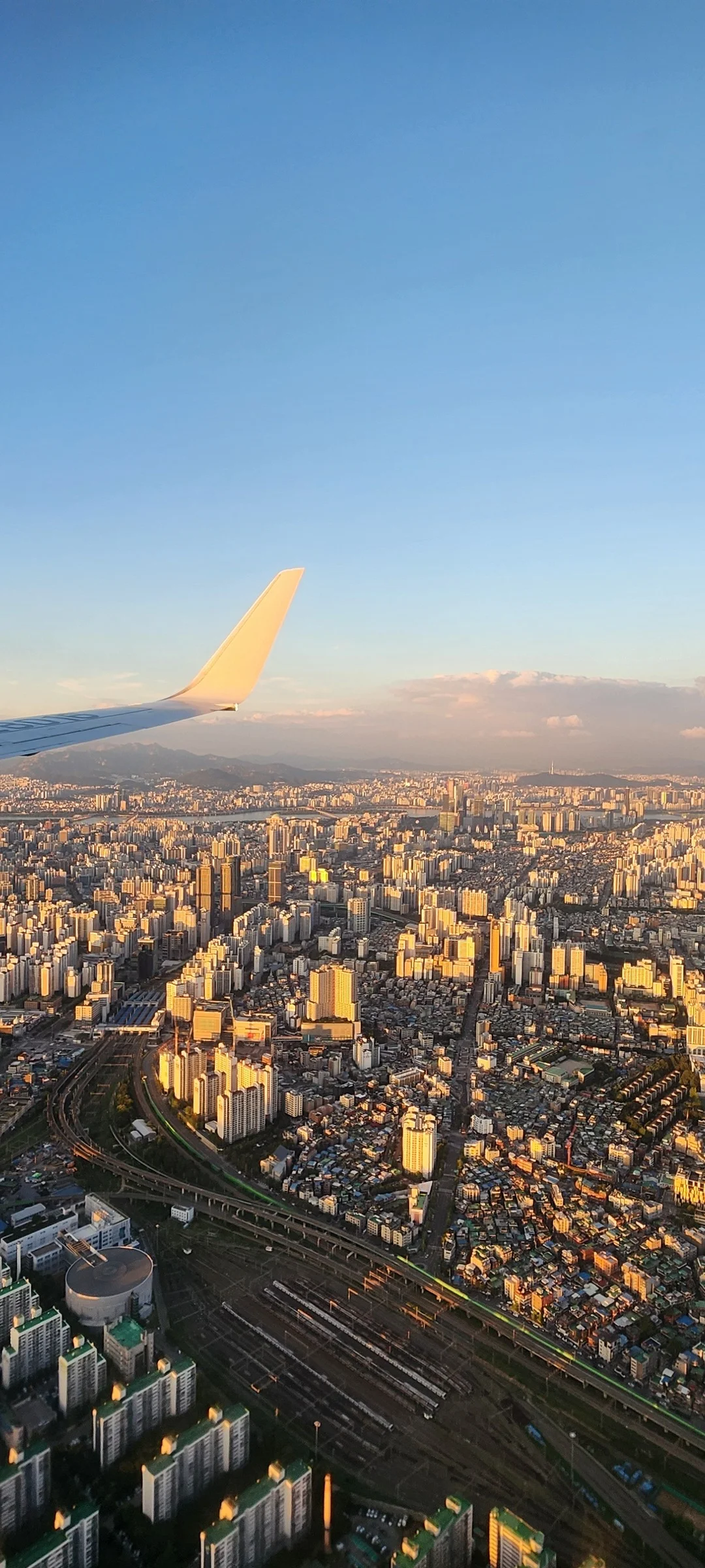 Explore Korea's architectural landscape through stunning phone wallpapers that span centuries of design. From the sleek glass curtain walls of Gangnam's skyscrapers to the raw concrete forms of brutalist apartment complexes, these images capture how Korea blends cutting-edge modernity with bold structural expression.

Look closer and you'll discover geometric patterns in subway station ceilings, sweeping curves of the Dongdaemun Design Plaza, and the quiet symmetry of traditional gate structures standing beside high-rises. Whether you're drawn to minimalist Korean design or dramatic urban geometry, these free aesthetic wallpapers transform your phone background into a gallery of architectural photography., Gurodong-ro 17-gil, Guro 2(i)-dong, Seoul — Free Korean aesthetic wallpaper