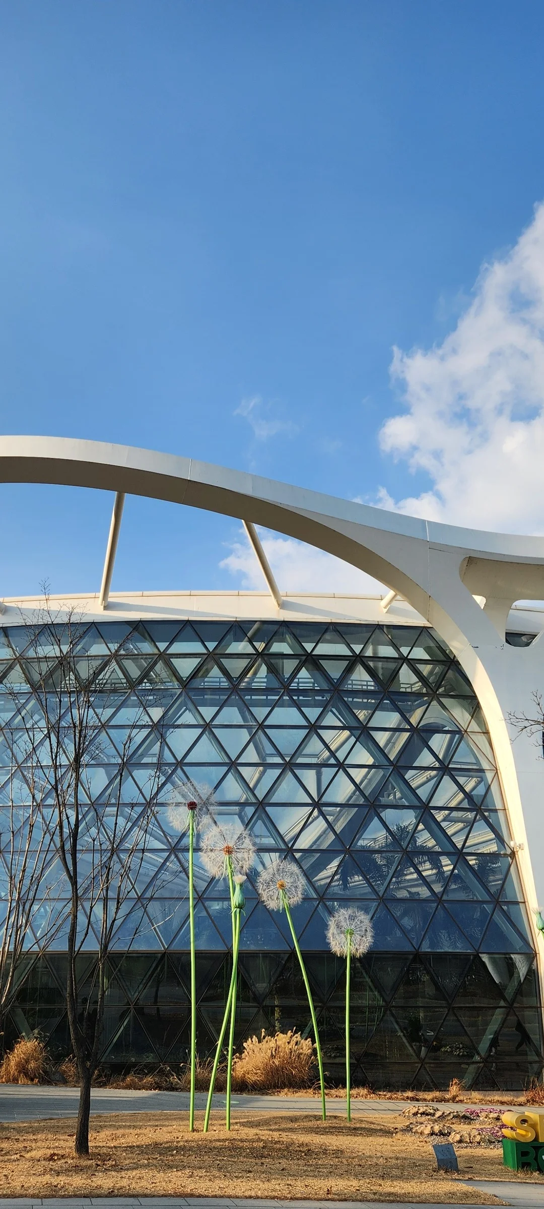 Explore Korea's architectural landscape through stunning phone wallpapers that span centuries of design. From the sleek glass curtain walls of Gangnam's skyscrapers to the raw concrete forms of brutalist apartment complexes, these images capture how Korea blends cutting-edge modernity with bold structural expression.

Look closer and you'll discover geometric patterns in subway station ceilings, sweeping curves of the Dongdaemun Design Plaza, and the quiet symmetry of traditional gate structures standing beside high-rises. Whether you're drawn to minimalist Korean design or dramatic urban geometry, these free aesthetic wallpapers transform your phone background into a gallery of architectural photography., Magokdong-ro, 마곡지구도시개발지구, Seoul — Free Korean aesthetic wallpaper